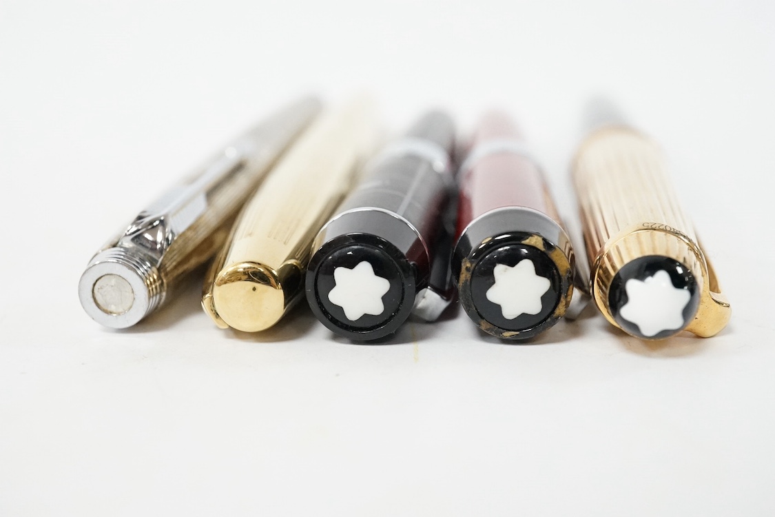Five pens including a Parker pen with 14k gold nib and four Mont Blanc style pens. Condition - fair